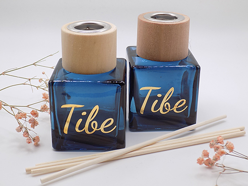 Parfumflesje blauw met houten dop